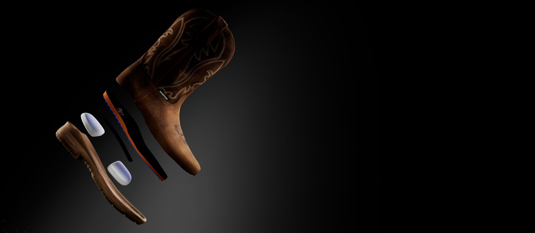 An explosion of a NiTread work boot showing the internal components of the boot .