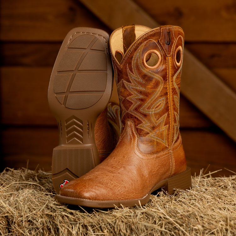 Roswell 11-inch smooth ostrich western boots in cognac. Shop Roswell