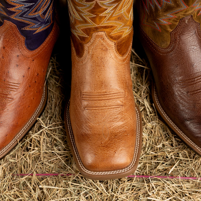 A close up of Justin square-toe boots.