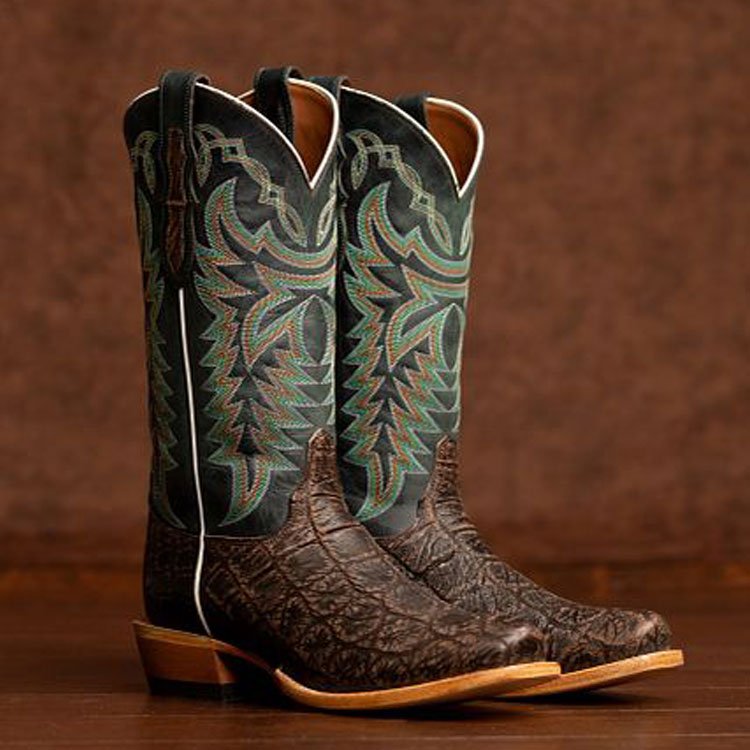Men's McNeely 13" crocodile cowboy boot on a brown wood floor.