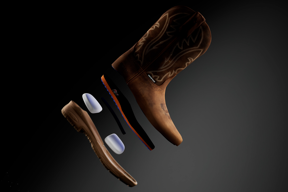 An explosion of a NiTread work boot showing the internal components of the boot .